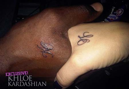 These are new font tattoo pictures on the hand of Khloe Kardashianthe