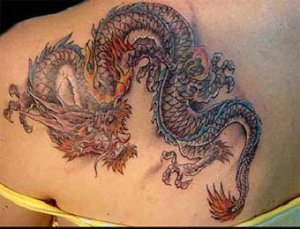 dragon tattoo on back girl